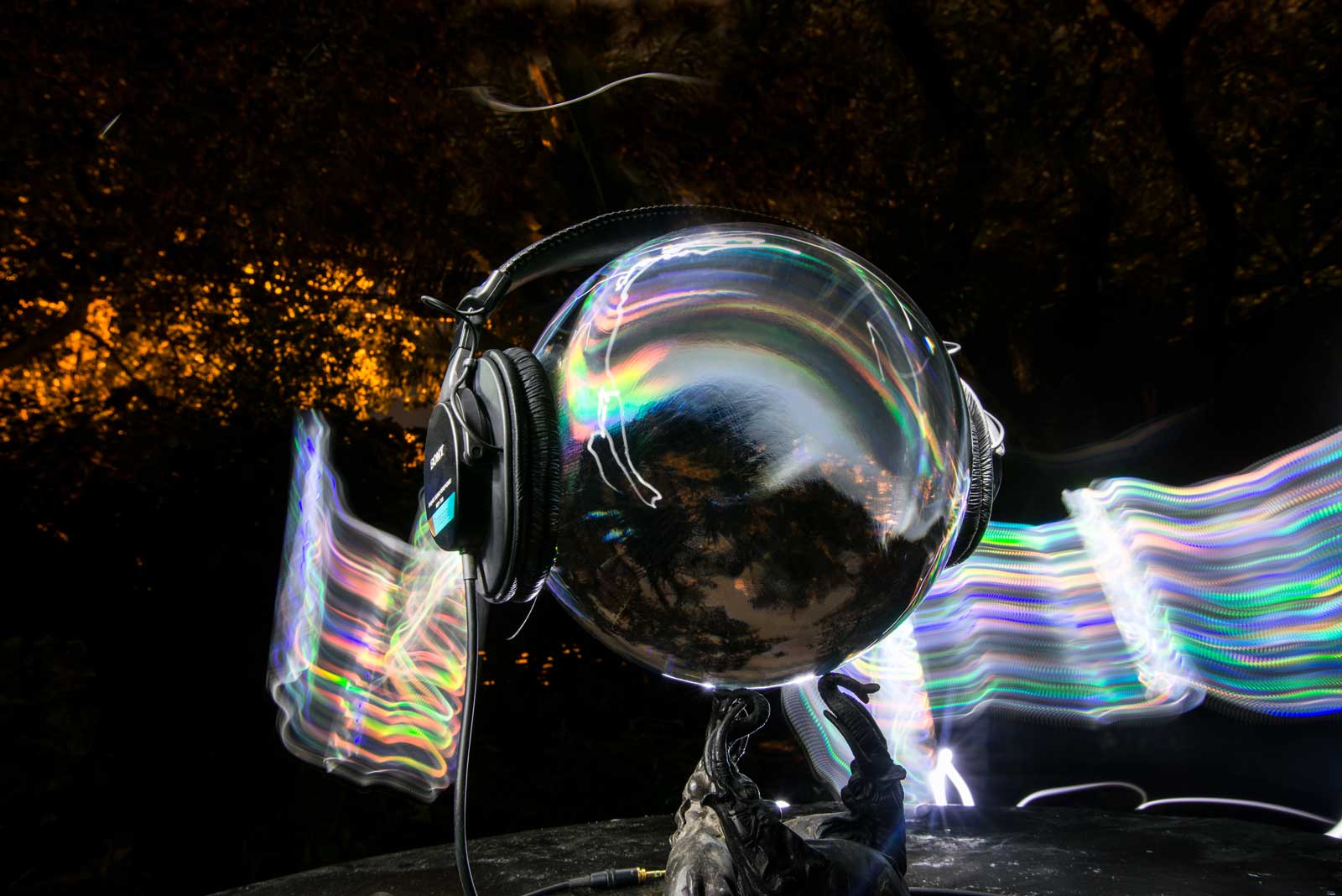 Headphones on Crystal Ball and Light Painting